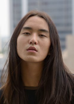 portrait-of-young-asian-man-with-long-hair-2022-02-02-03-59-14-utc.jpg